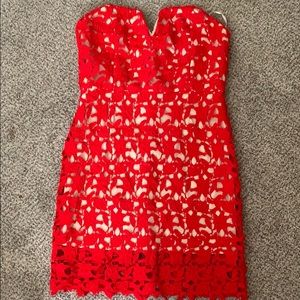Red lace dress with nude slip under strapless